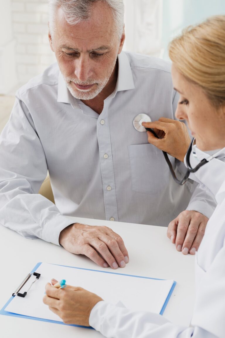 doctor writing clipboard while auscultating min scaled 1